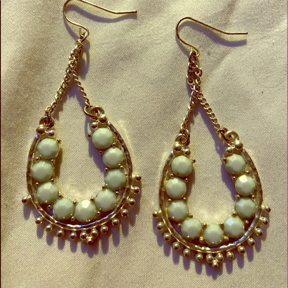 Dangling light green earrings